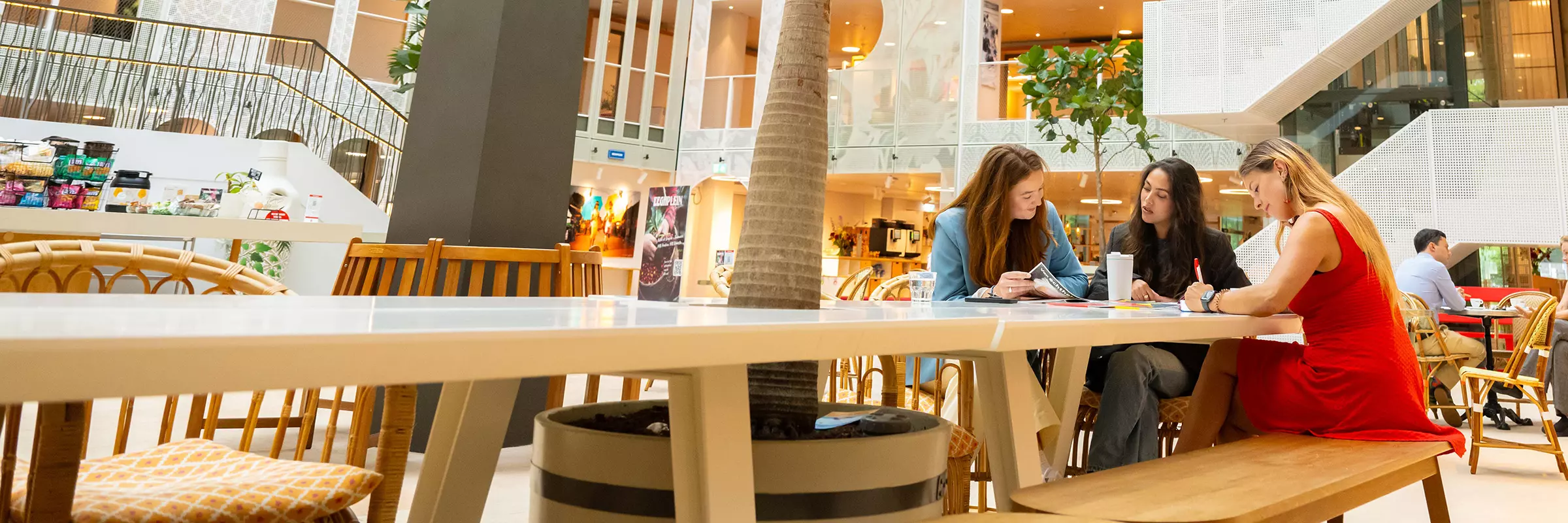 Employees at desk in office